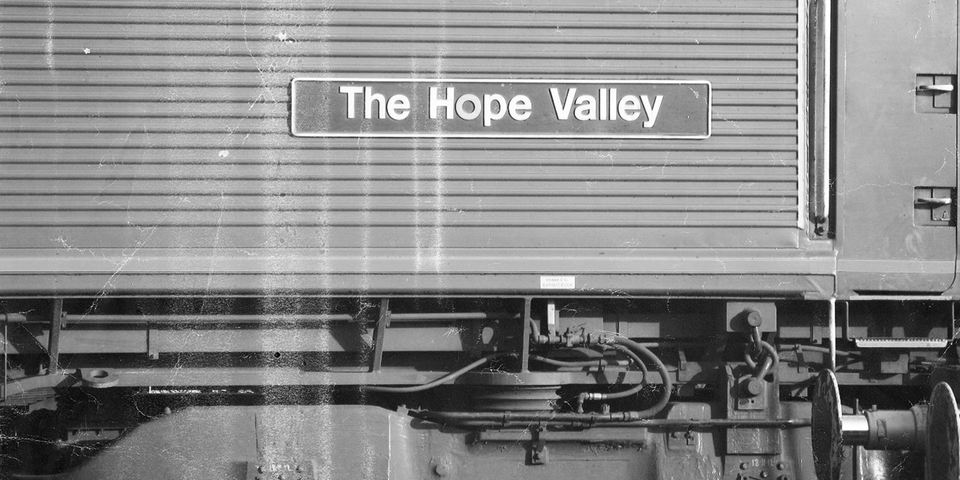 train carriage with an attached sign reading 'the hope valley'